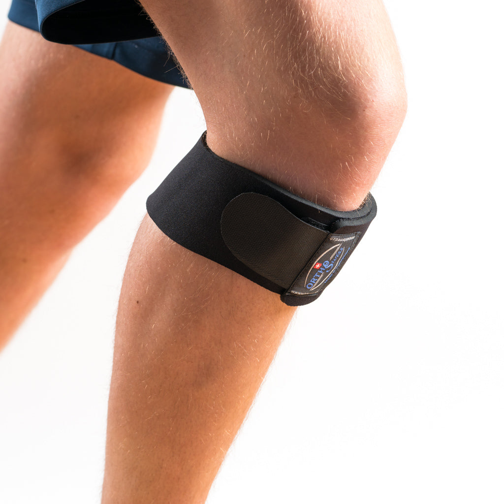 Orthoswiss Mini Kniebandage unterhalb der Kniescheibe, Nahaufnahme seitliche Ansicht.